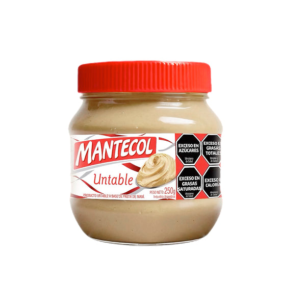 Jar of Mantecol peanut butter with a red lid on a white background